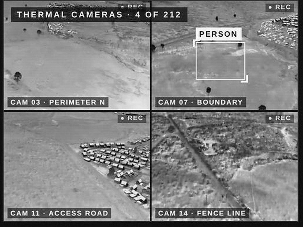 Wall of four thermal camera feeds monitored from the Tactical Operations Center, with a person detected on the boundary