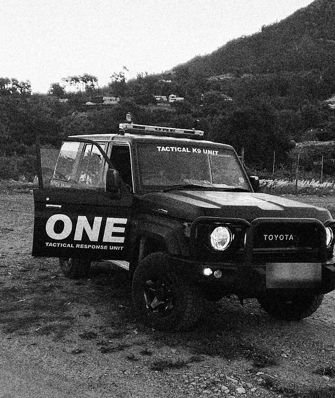 ONE Tactical Response Unit Land Cruiser on a rural road